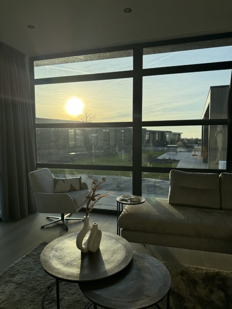 Bright open plan living area Villa Meerzicht morning light